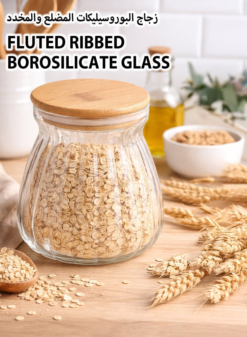 توشيونيكس طقم برطمانات توابل زجاجية مكون من 7 قطع مع رف من الخيزران ذي طبقتين | برطمانات تخزين مضلعة من زجاج البوروسيليكات مع أغطية محكمة الإغلاق من الخيزران | منظم سطح المطبخ للتوابل والأعشاب والبهارات - Image 2